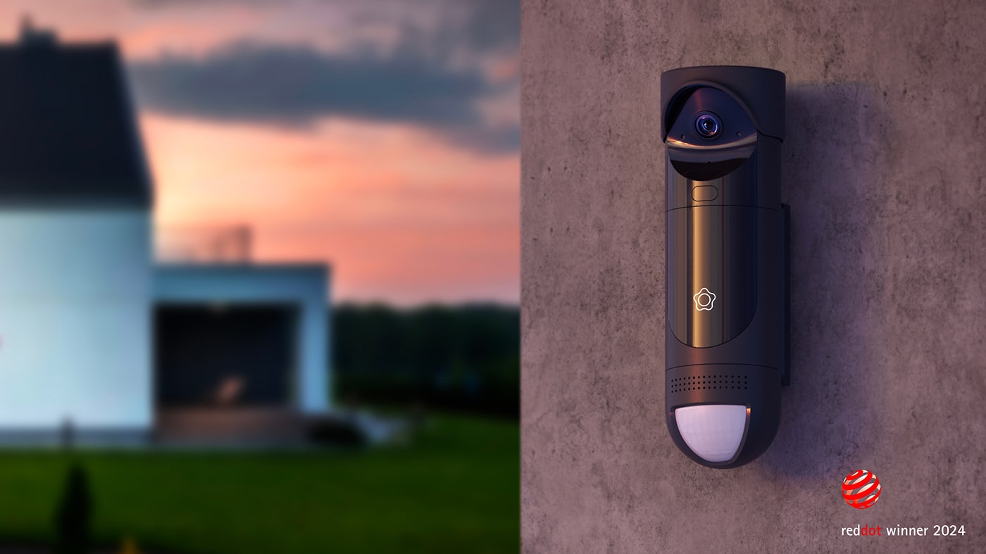 Verisure GuardVision™ camera on the wall of a house. Winner of Red Dot Design award in 2024